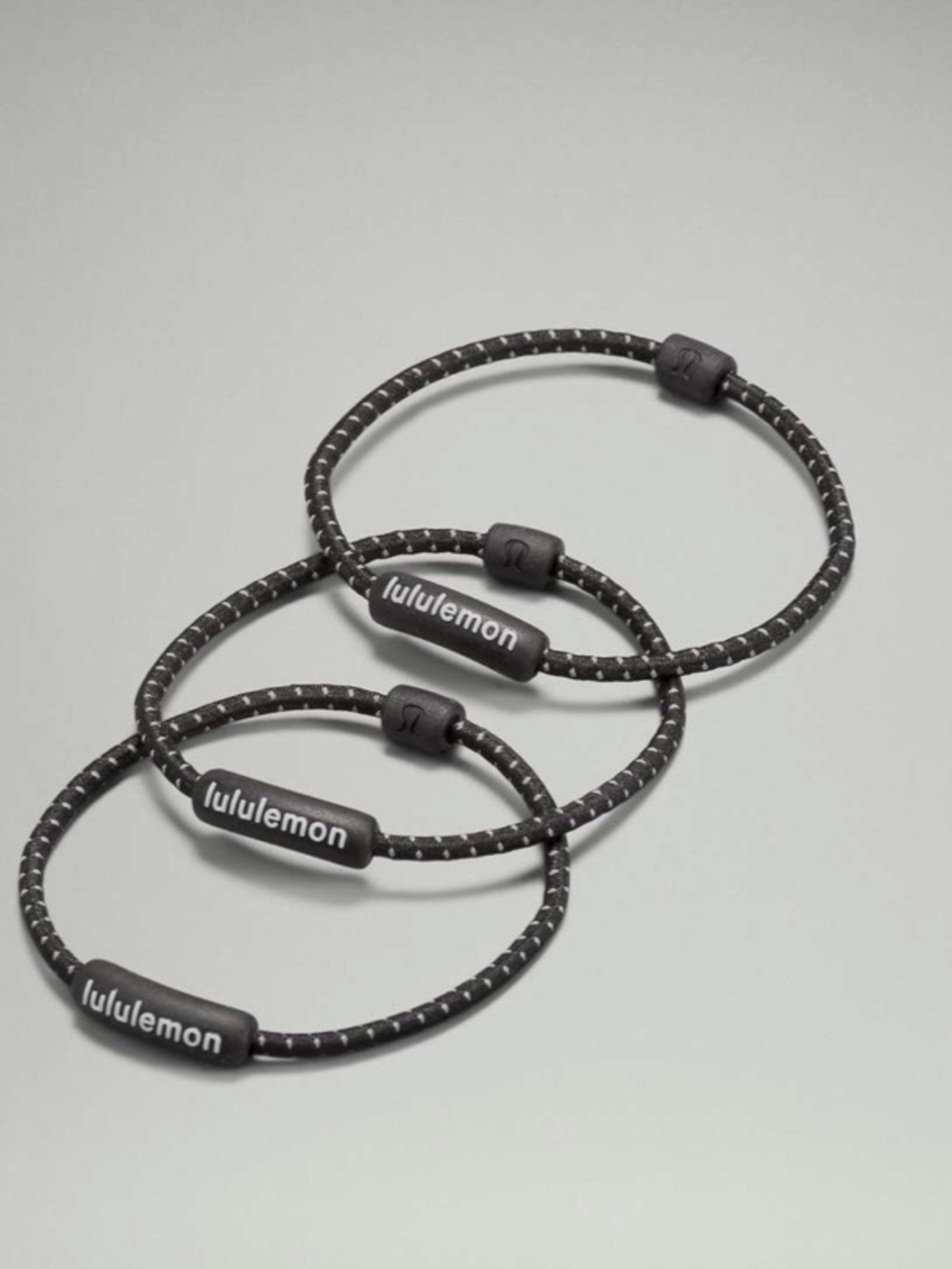 Lululemon Black Silicone Hair Tie Trio with Reflective Dots